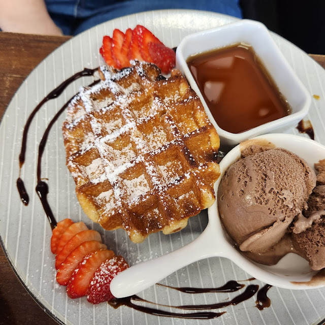 Waffle with the Lot Belgian Style Waffle Strawberries Maple Bacon and Belgian Chocolate Ice Cream